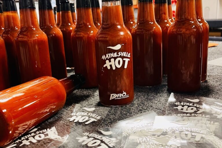 UV printed Haynesville Hot labels on hot sauce bottles with UV transfer sheets